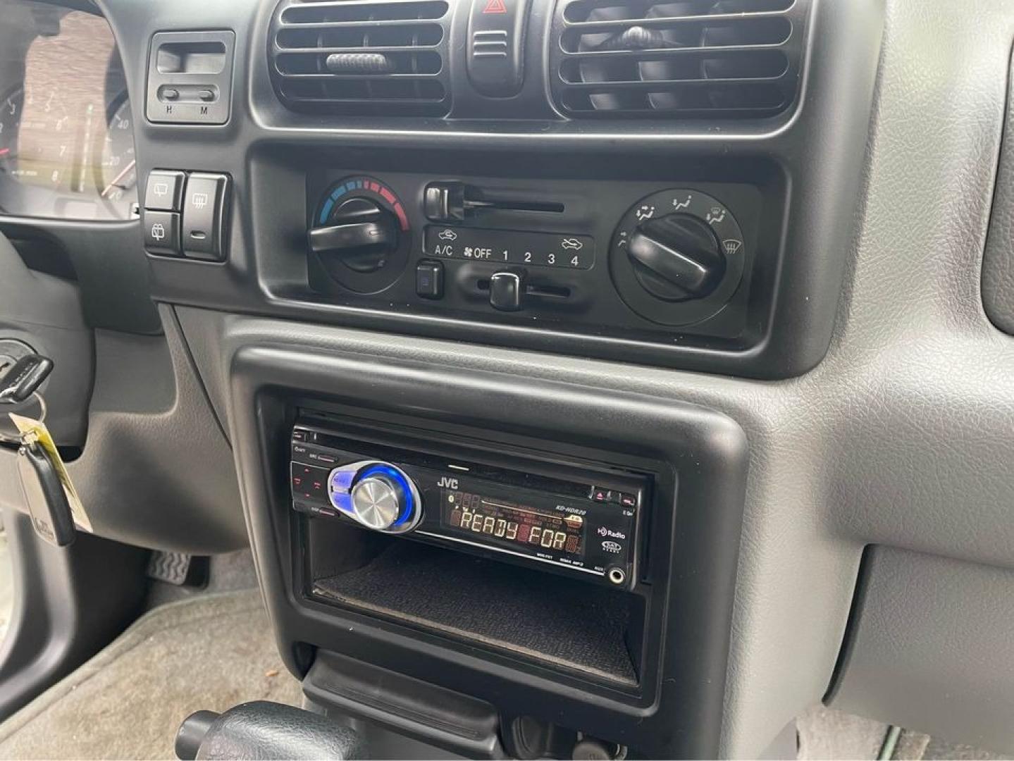 2001 white /Grey Isuzu Rodeo LS (4S2CK58W114) with an V6 engine, Auto transmission, located at 5700 Curlew Drive, Norfolk, VA, 23502, (757) 455-6330, 36.841885, -76.209412 - Photo#12